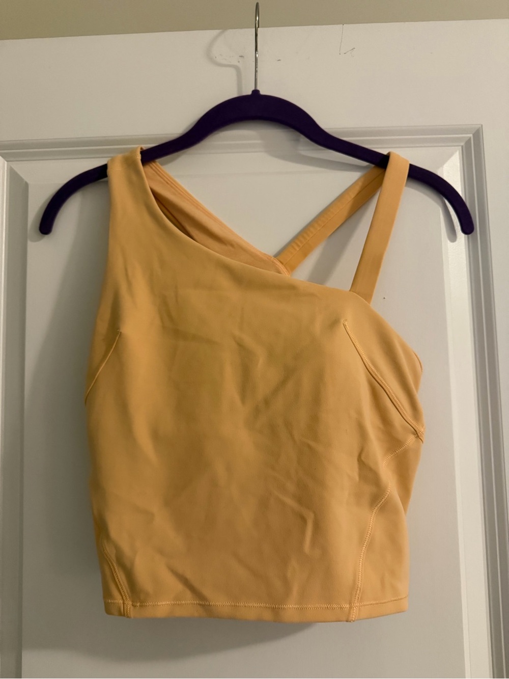 Women’s Asymmetric light orange tank top size 6